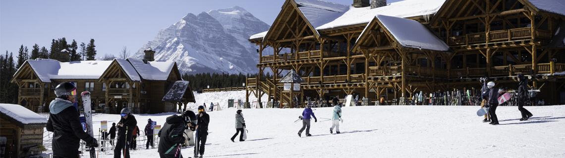 Exterior view of a ski lodge with snow